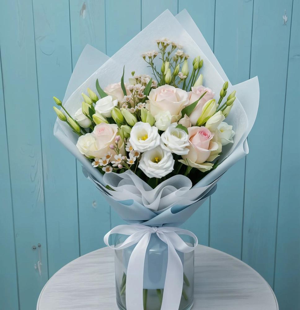 Букет цветов из: Розы и Лизиантусы в Северном